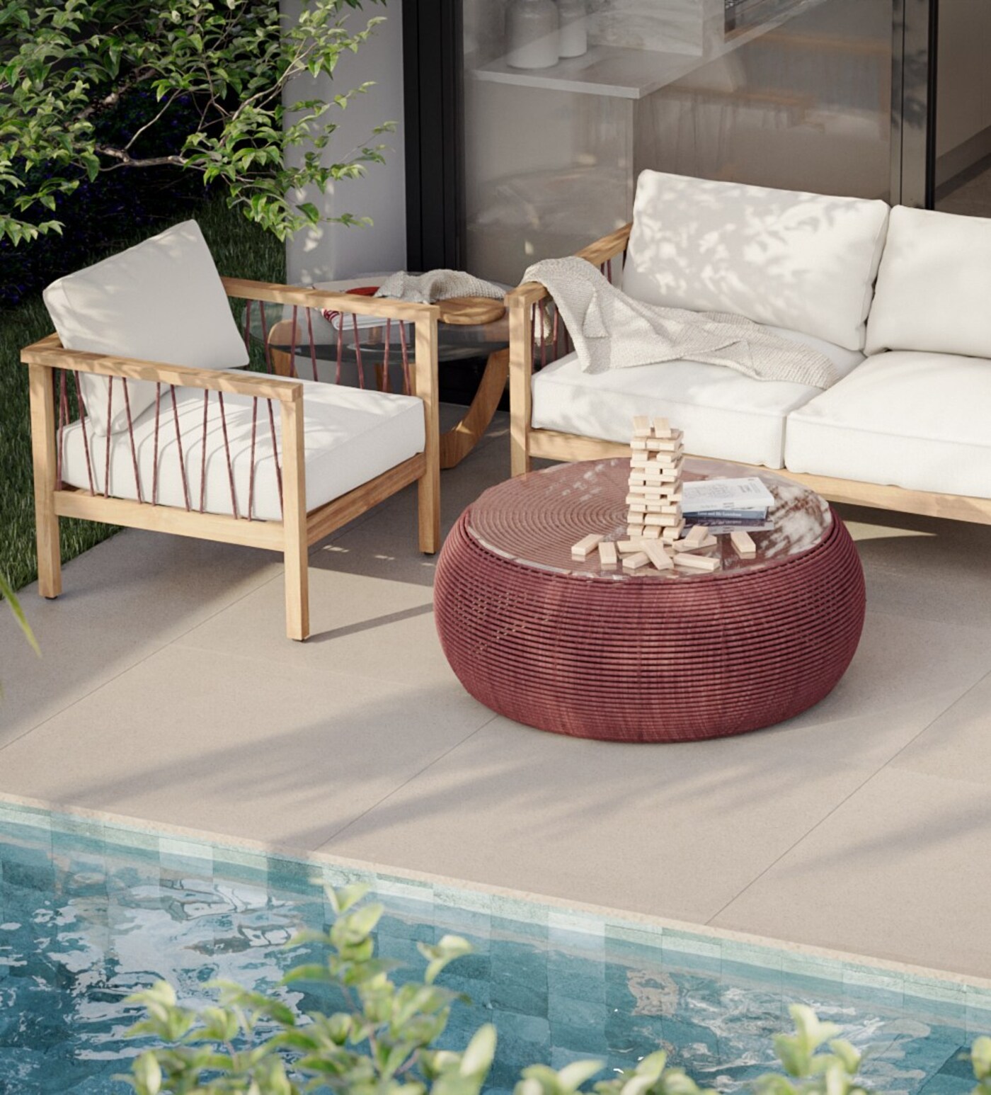 Lounge externo do Uni com espreguiçadeiras junto à piscina